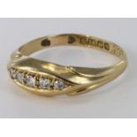 18ct yellow gold diamond set five stone ring, size Q, weight 2.3g.