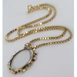 14ct Gold Box Chain with a gold Crystal photograph pendant weight 16g