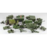 Dinky. A collection of approximately fifteen military Dinky vehicles, including lorries, tanks,