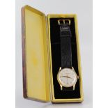 In its original box, gents 9ct cased wristwatch by "Winegartens" the cream dial with gilt arabic