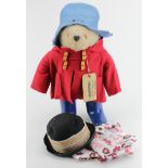 Gabrielle Paddington Bear with red coat, blue hat and blue dunlop boots, with original label, height