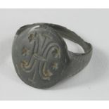 Byzantine Religious Ring with Christ Monogram , ca. 1000 AD, ocal shaped band with integral bezel.