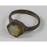Medieval ring with Glass Gem, ca. 1500 AD, oval shaped band with round bezel; glas/stone gem