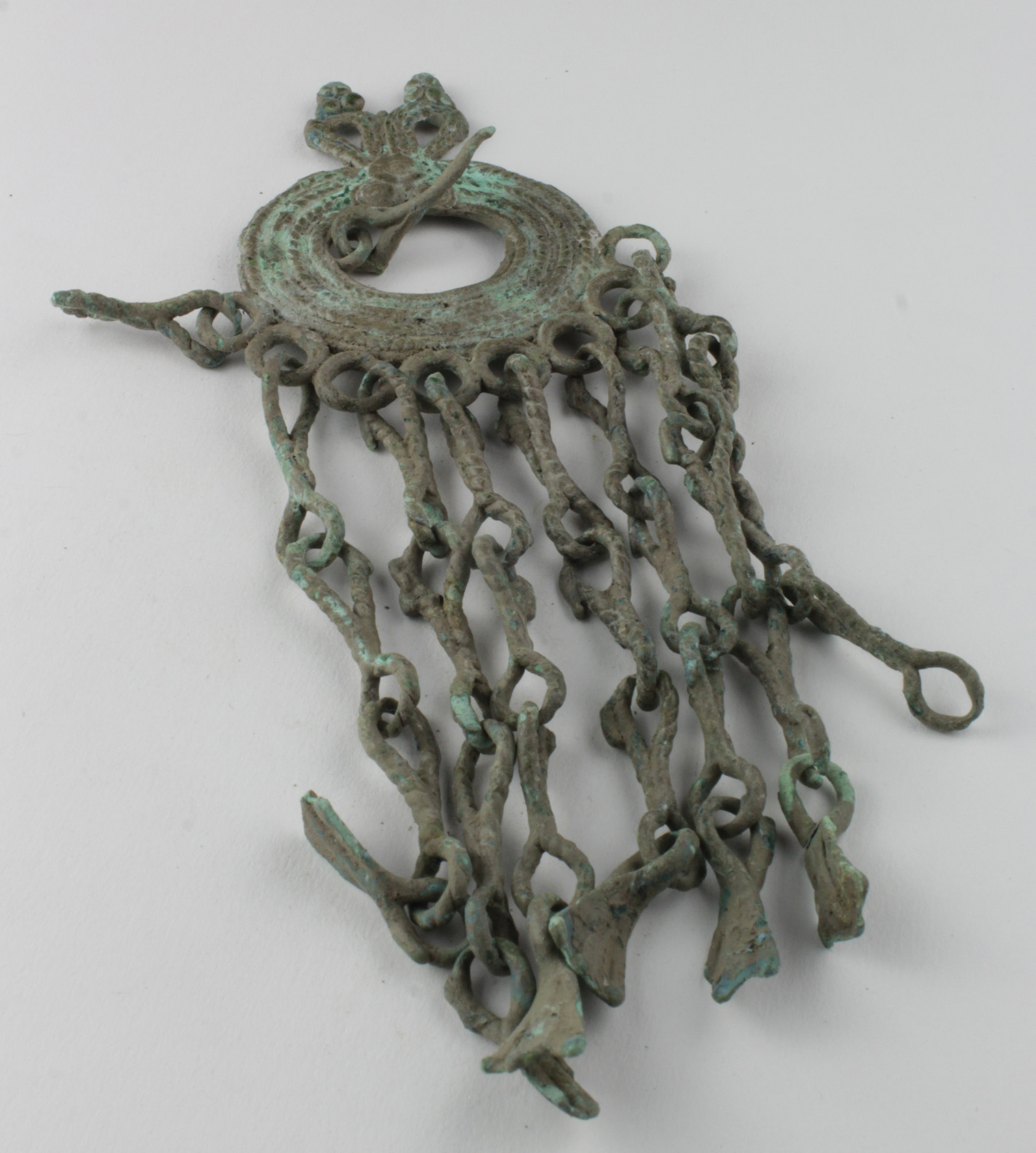 Large Viking Dragon Brooch with Tassels, ca. 900 AD, omega shaped broocj with filigree decoration;