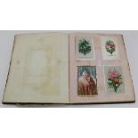 Album. An album containing numerous greetings cards & scraps, circa late 19th century,