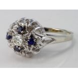 14ct white gold diamond and sapphire bomb style cocktail ring, size M, weight 6.1g.