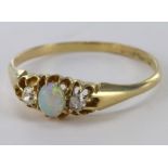 18ct Gold Opal and Diamond set Ring size U weight 2.8g
