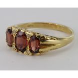 18ct Gold Garnet and Diamond set Gypsy style Ring size O weight 5.3g