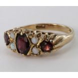 9ct Gold Garnet and Seed Pearl ring size L weight 3.7g