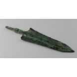 Bronze Age Spear, ca. 1000 B.C. Ancient Greek, Cast bronze with central rib and tang. Complete and