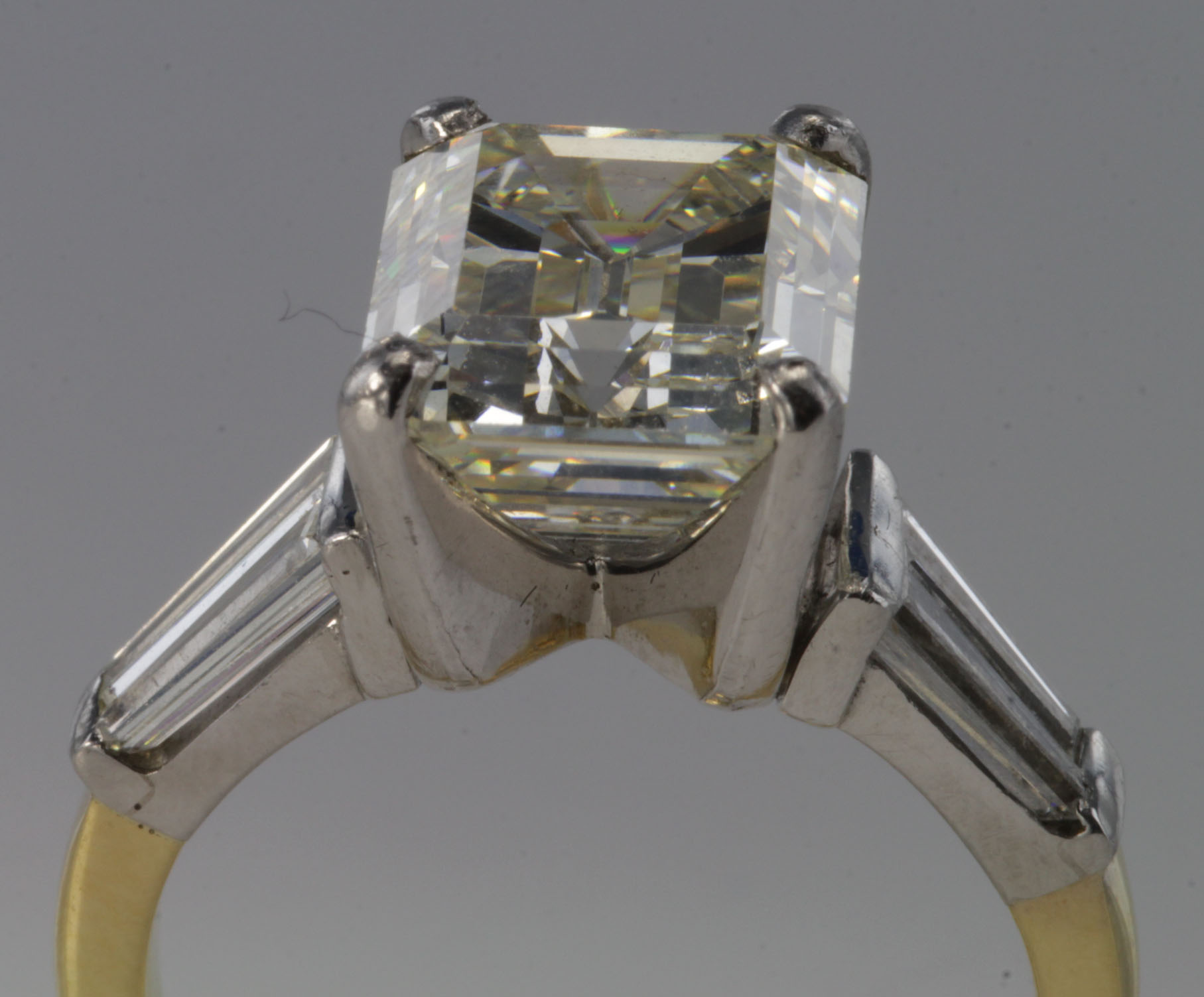 Exquisite 18ct ring set with single emerald cut diamond with a known diamond weight of 5.75ct with - Image 3 of 4