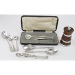 Silver. A collection of silver items, comprising silver banded oak pepper grinder, a butter knife