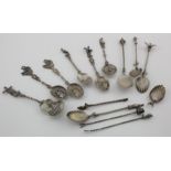 Thirteen silver souvenir items Dutch & German (one broken) Mostly spoons, quite a few bear the Dutch