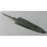 Bronze Age Spear, ca. 1000 B.C. Ancient Greek.Cast bronze with central rib and tang. Complete and in