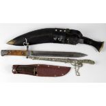 knives: 1) 1960s Sheath knife in scabbard G.C blade 5". 2) Tourist Kukri with Chakmak & Karda.