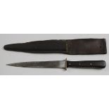 Fighting knife unusual WW2 1940 dated knife in its leather scabbard. Used by a member of the