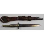 Commando dagger very scarce beaded & ribbed pattern in its leather scabbard.