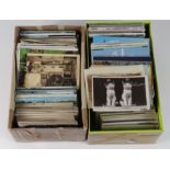 Foreign mixture of old and modern postcards in two packed shoe boxes, plus some London (qty)