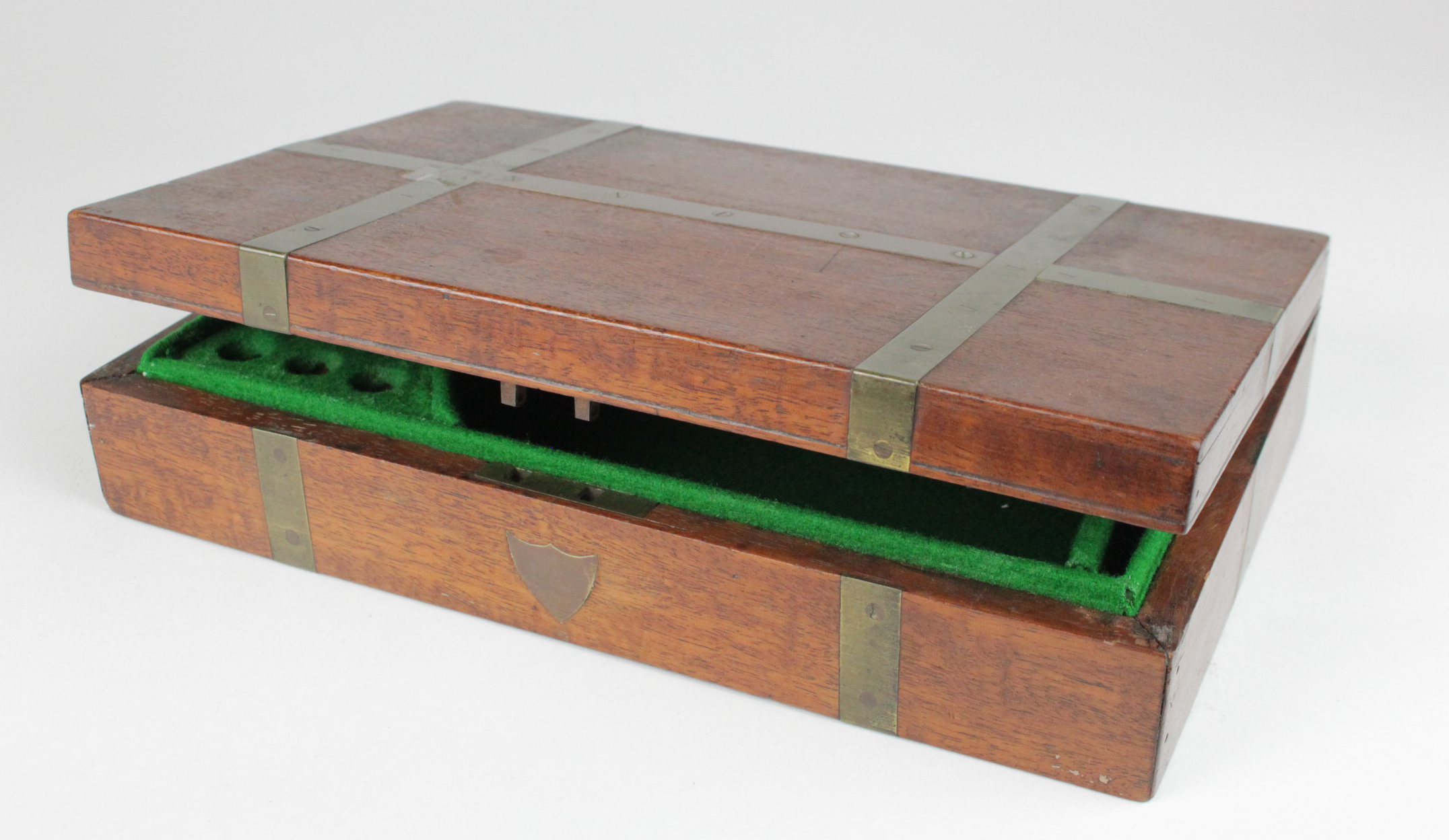 Brass bound, oak (?) box for an automatic pistol or revolver. Lined in green baize. A nicely made