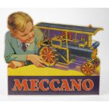 Original Meccano shop card showing a boy with a Meccano steam roller.