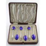 Six silver & enamel teaspoons, hallmarked 'SLd, Birmingham 1938', some enamel chipping, contained in