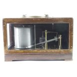 Casella barograph (no. 314), contained in original oak case, height 19cm, width 31cm, depth 15cm (