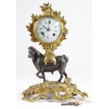 An unusual French ormolu mantle clock, circa late 19th Century, depicting a bull (possibly