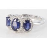 18ct white gold sapphire and diamond triple cluster ring, size N, weight 5.4g