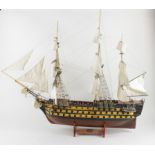 H.M.S. Victory. A detailed scale ship model of H.M.S. Victory, with three masts, hand painted, on