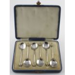Six silver & enamel coffee spoons, hallmarked 'T&S, Birmingham 1933', contained in a fitted case