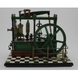 Stationary engine. A six column live steam stationary engine with six spoked flywheel 'Lady