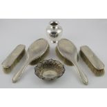 Silver. A collection of six silver items, comprising four brushes, bon bon dish and vase (stamped '