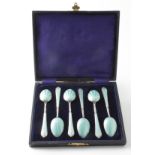 Six silver & enamel teaspoons, hallmarked 'SLd, Birmingham 1932', some enamel chipping, contained in