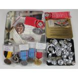 Fire Service collection of assorted foreign medals and badges, plus a tin of British FB Rank