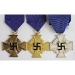 German Nazi 40 Years Loyal Service Cross x2, plus a 25 Years Loyal Service Cross. (3)