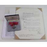 MBE (Civil) in Royal Mint case of issue, with original Warrant, service book, 5x letters from the