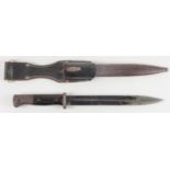 German Mauser knife bayonet, blade stamped 'P 8975' and '41 clc'. Bakelite handle, with metal
