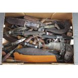 Large banana box full of various Middle Eastern, Malayan, British, knives, daggers, bayonets. A real