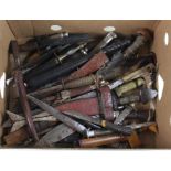 Large banana box full of various African, Malayan, British, knives, daggers, bayonets. A real