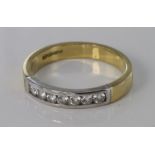 18ct diamond seven stone channel set half eternity ring, approx. 0.25ct, size O, weight 4.2g