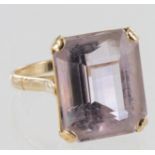 Yellow metal (stamped 18k) ladies dress ring with a large pink stone, size O, weight 7.3g