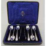 Boxed set of six silver teaspoons and a pair of silver sugar tongs - all hallmarked HW Sheffield,