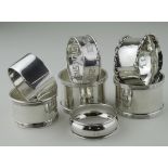 Eight silver napkin rings includes two matching pairs - various hallmarks. Weight of silver 5.25