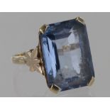 9ct yellow gold rectangular single blue stone ring, size N, weight 6.9g.