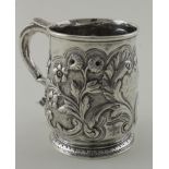 George I silver tankard with later decoration and inscription. The inscription reads "L.C.M.W.