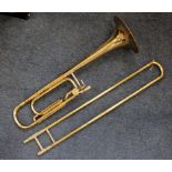 Conn brass trombone, with mouthpiece etc., contained in a carry case