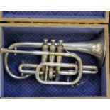 Hawkes & Son silver plated cornet, contained in a carrying case