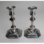 Silver pair of candlesticks, hallmarked 'TB, London 1901, weighted bases height 17cm approx.