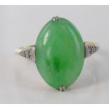 18ct yellow gold oval jade ring with diamond accents, size N, weight 4.3g