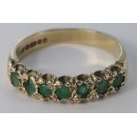 9ct Gold seven stone Emerald set Ring size N weight 2.9g